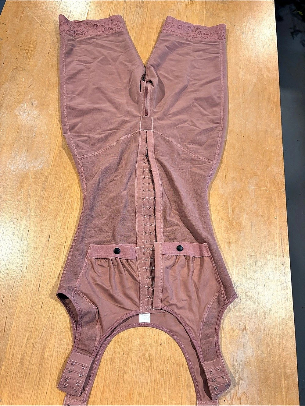 faja shapewear bodysuit with a built-in bra and front hook-and-eye closure rose
